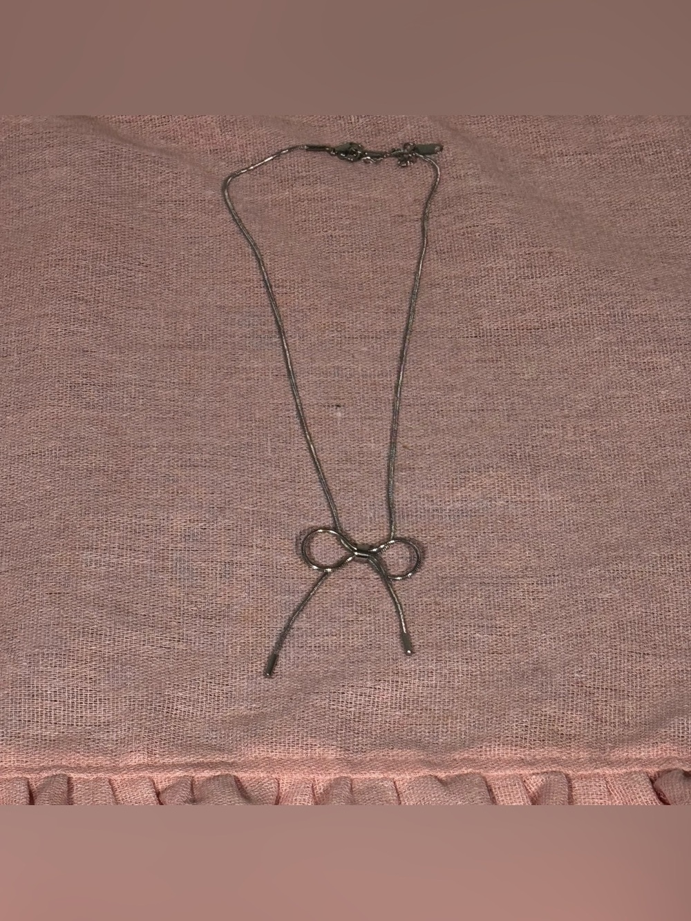Delicate Bow Pendant Necklace in Silver